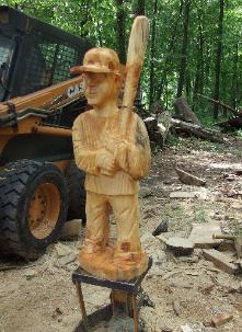 chainsaw sculpture baseball player