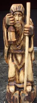 Hooded monk chainsaw carving Michigan