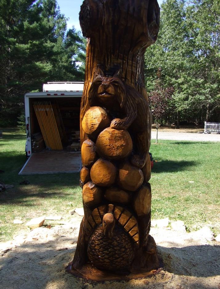 Bobcat chainsaw carving by Jim Barnes
