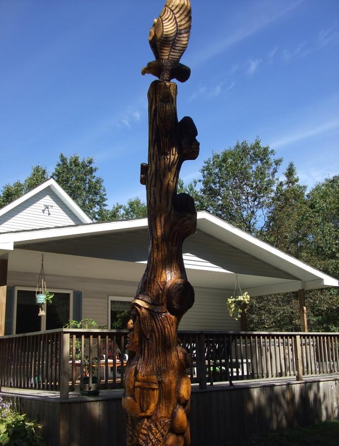 Tree carving by chainsaw carver Jim Barnes
