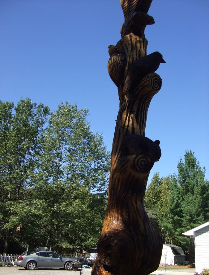 Chainsaw carving Tawas Michigan